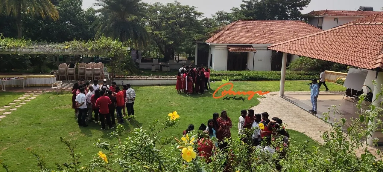 Employees participating in high-energy outdoor adventure games and outbound training managed by corporate team building organizers in India